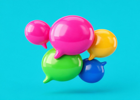 A cluster of five glossy speech bubbles